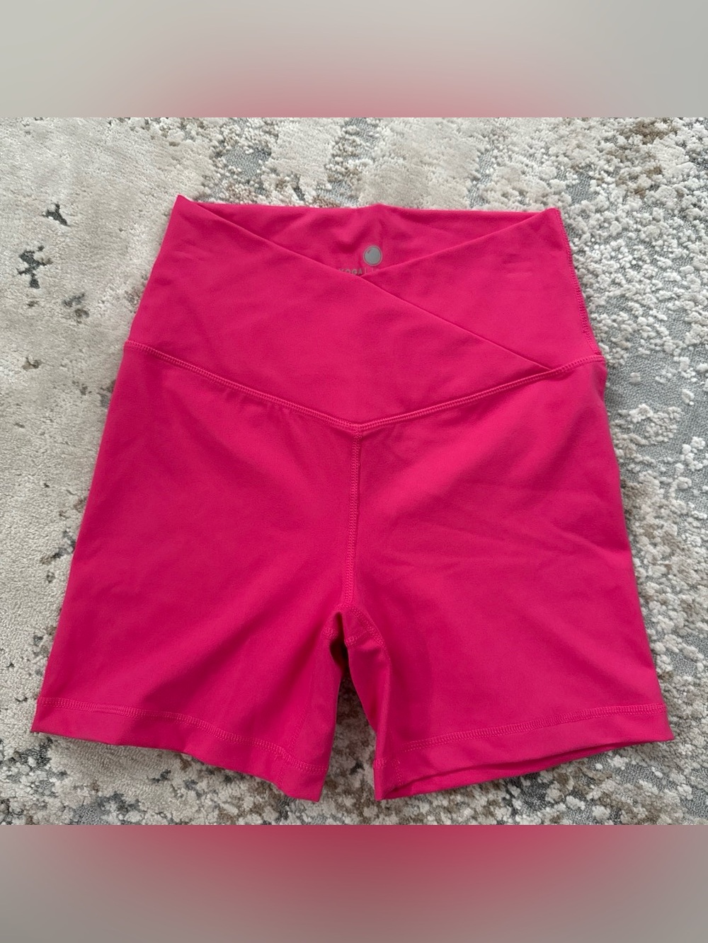 Yogalicious pink crossover workout shorts in size S